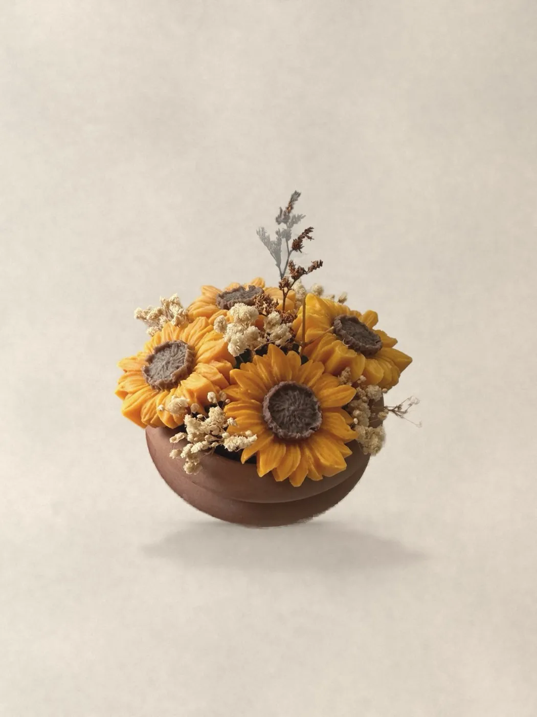 The sunflower bouquet on a plaster table